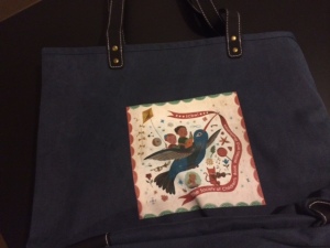The fabulous John Parra's art work graces an SCBWI bag, which I bought (of course).